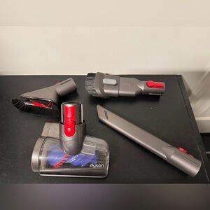 Dyson Vacuum Tool with Blue and Red Accents